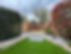 Garden with shaped hedges and trees