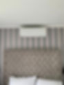 AC unit above a bed