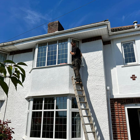 White house with traditional style windows
