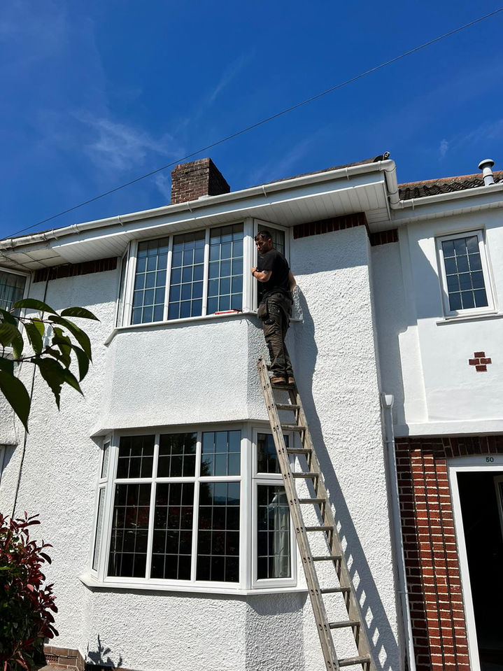 White house with traditional style windows