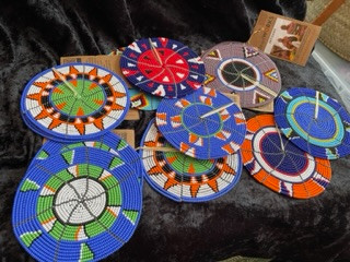 Selection of colourful disc shaped ornaments or plates