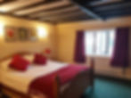 Red and white bed.jpg