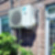 Wall mounted DAIKIN AC unit, sunny day