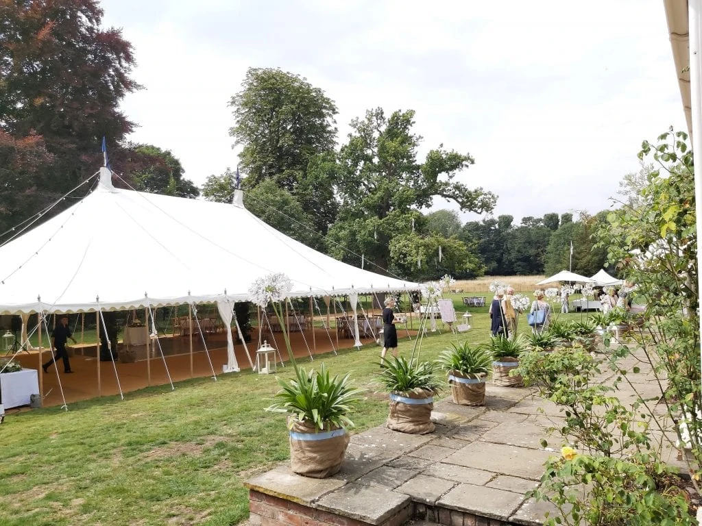Large open marquee in large gardens