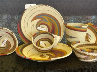 White and brown patterned plates and bowls