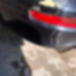Porsche bumper with scuffs and scrapes