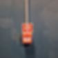 A red 'press in case of fire' box