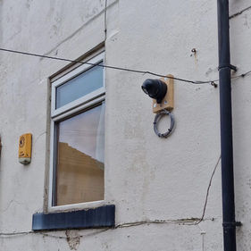 CCTV camera on temporary wood mount