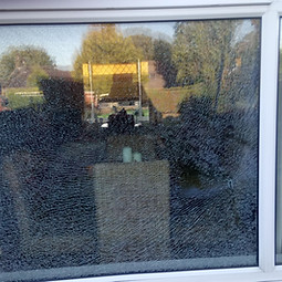 Smashed window on a house