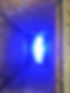 Blue light seen down a drain