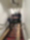 Moving a small car down stairs