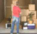 Man organising a storage unit