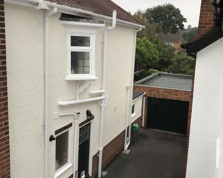 House with cream render