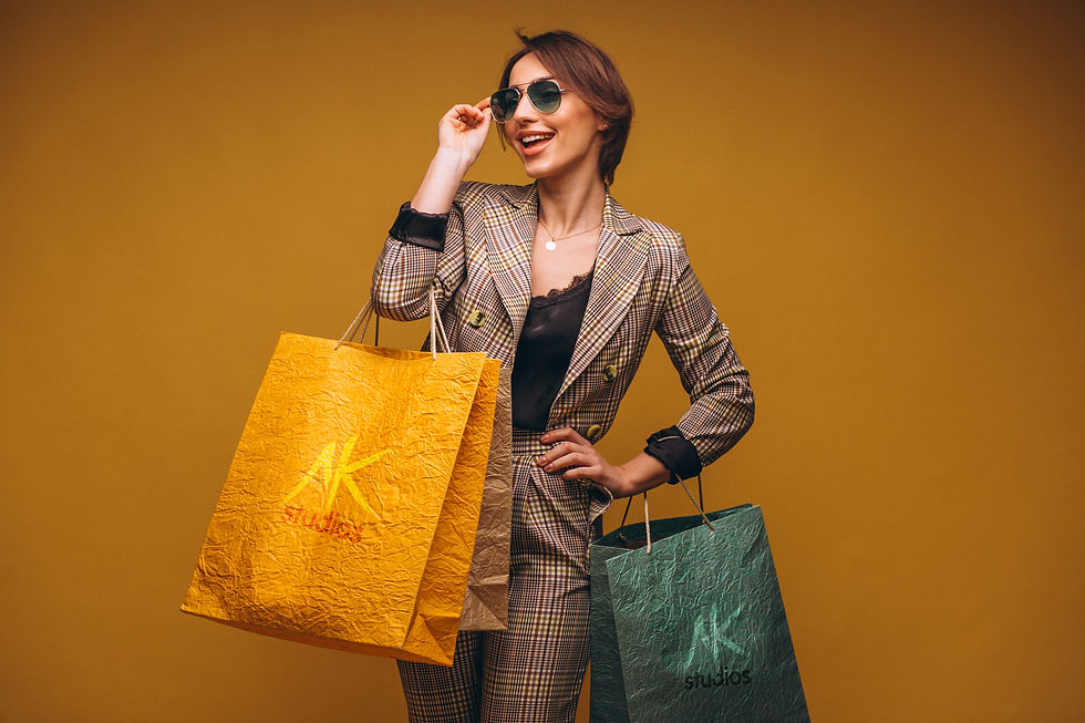 woman-with-shopping-bags-studio-yellow-background-isolated