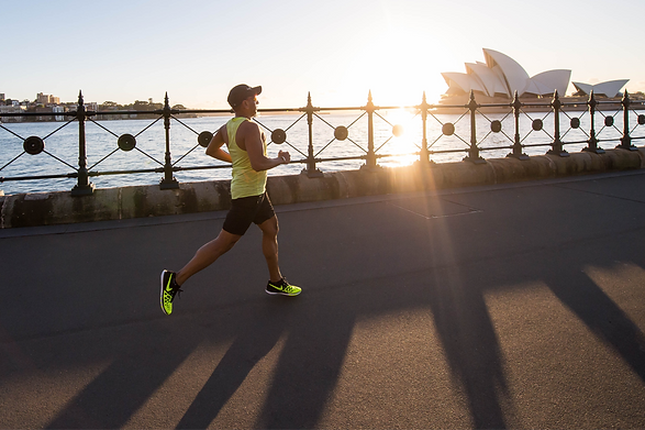 man running on bay walk during daytime_edited.png