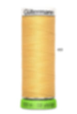 bobine de fil à coudre jaune