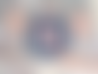 Two St. Victor School students and a parent smile at a kitchen table, holding small treats, with the St. Victor School crest and “Established 1964” logo centered over the image, representing family, legacy, and community in the Berryessa neighborhood.