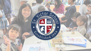 Students from preschool through middle school participate in a collaborative classroom activity at St. Victor School in San Jose.