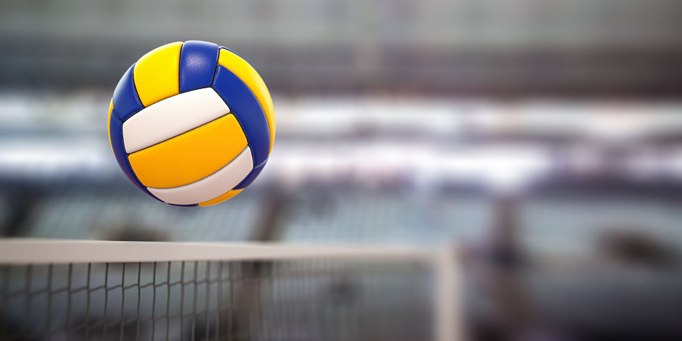 Bright volleyball floating above the net indoors. / Photo by 'Maxxyustas', licensed by Envato.com.