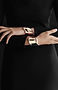 Elegant rose gold cuffs on wrists
