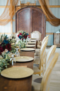 Backwoods Barn Iowa wedding venue indoor seating.
