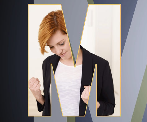 Red haired smiling young woman with fists pumped because she is motivated