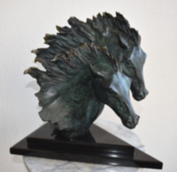 Horses on the run sculpture