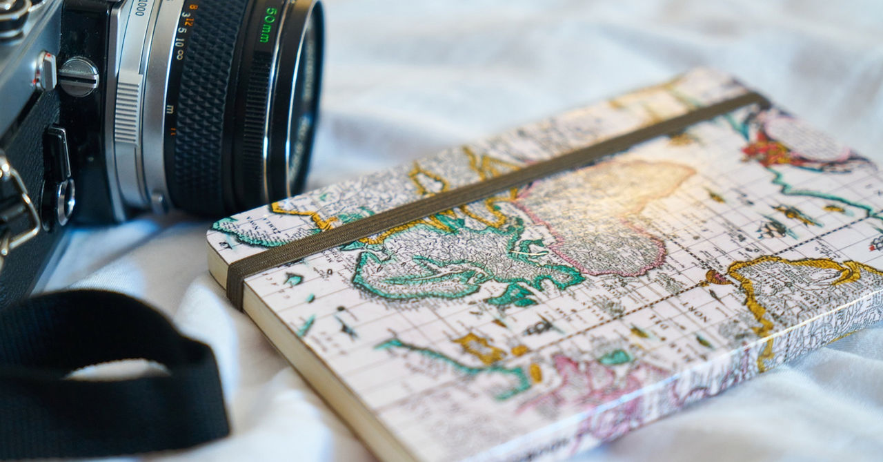 A camera sits next to a map of the Boundary Waters