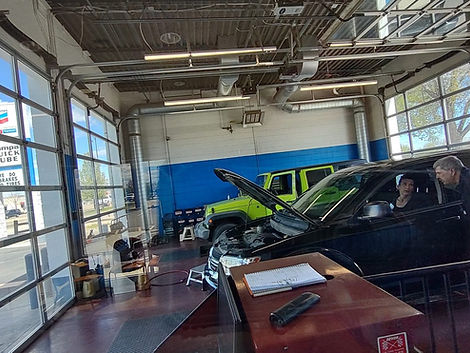 Technician working in a Nampa Quick Lube service bay