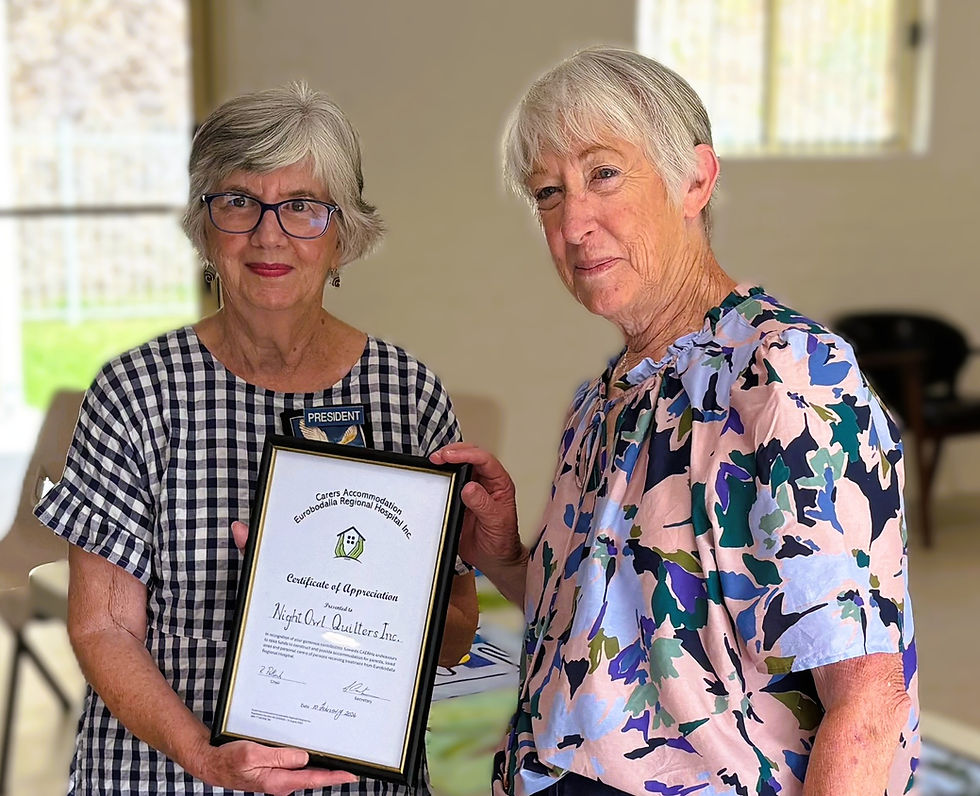 Night Owl Quilters Donate to CAERH