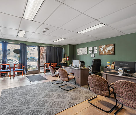 Office interior with desk, chairs, and
