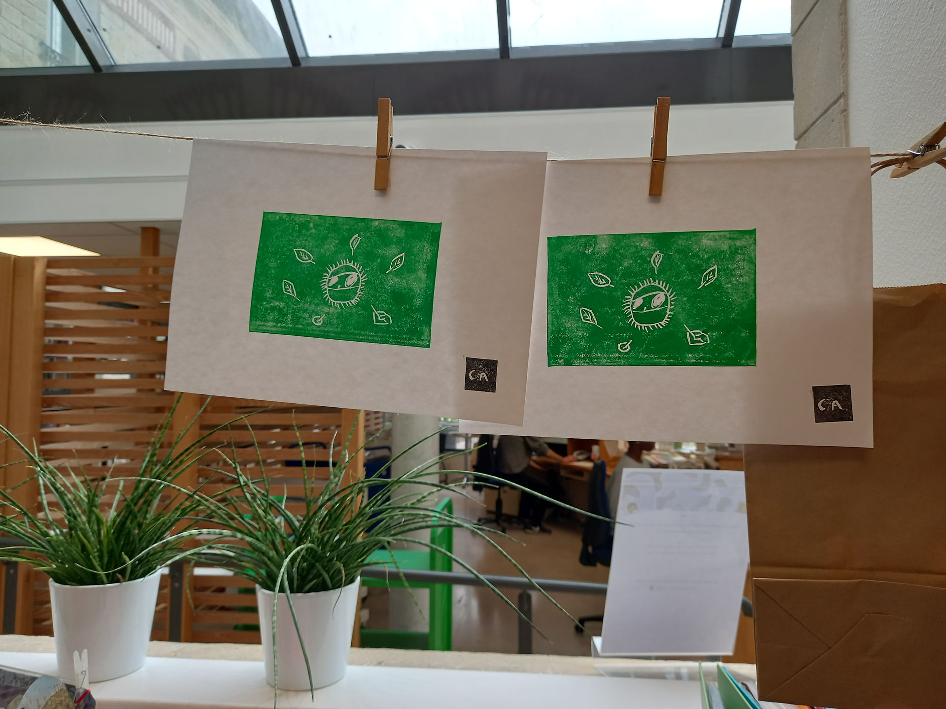 Printmaking workshops at Chantilly media library:prints by a 5 yo drying