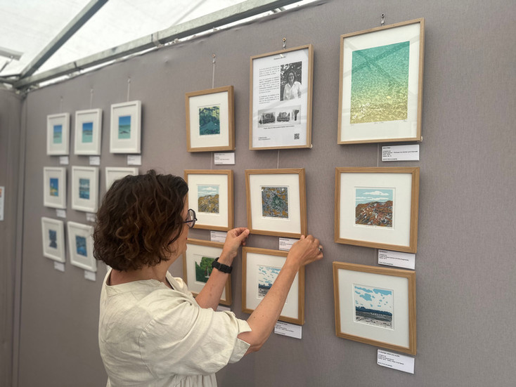 Florence Jalice setting up her prints