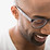 Smiling man with glasses