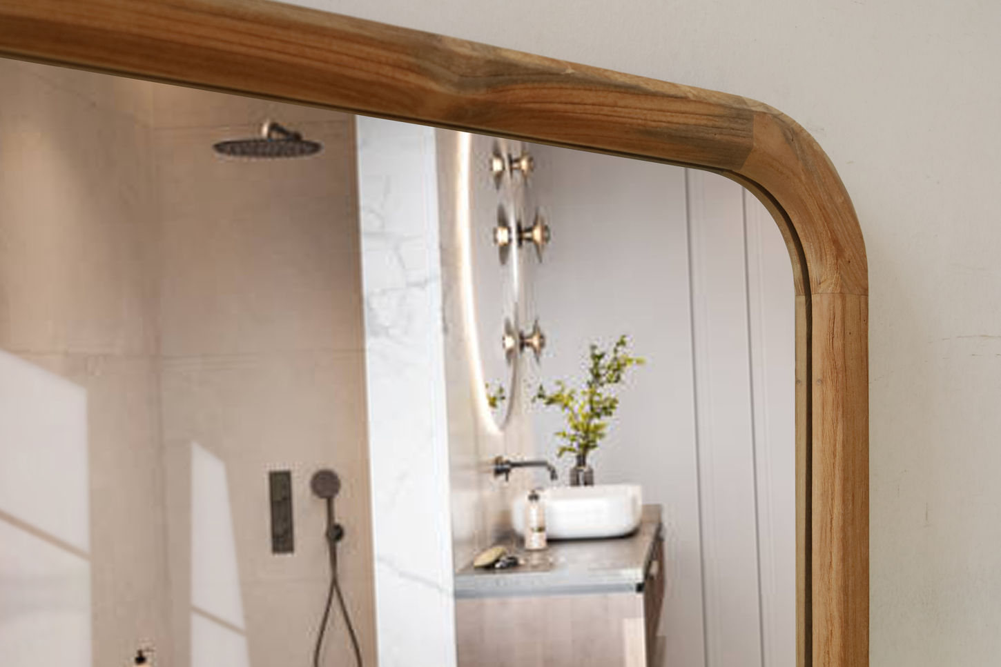 Toraja mirror in reclaimed teakwood with soft curvy edges and a clean modern design