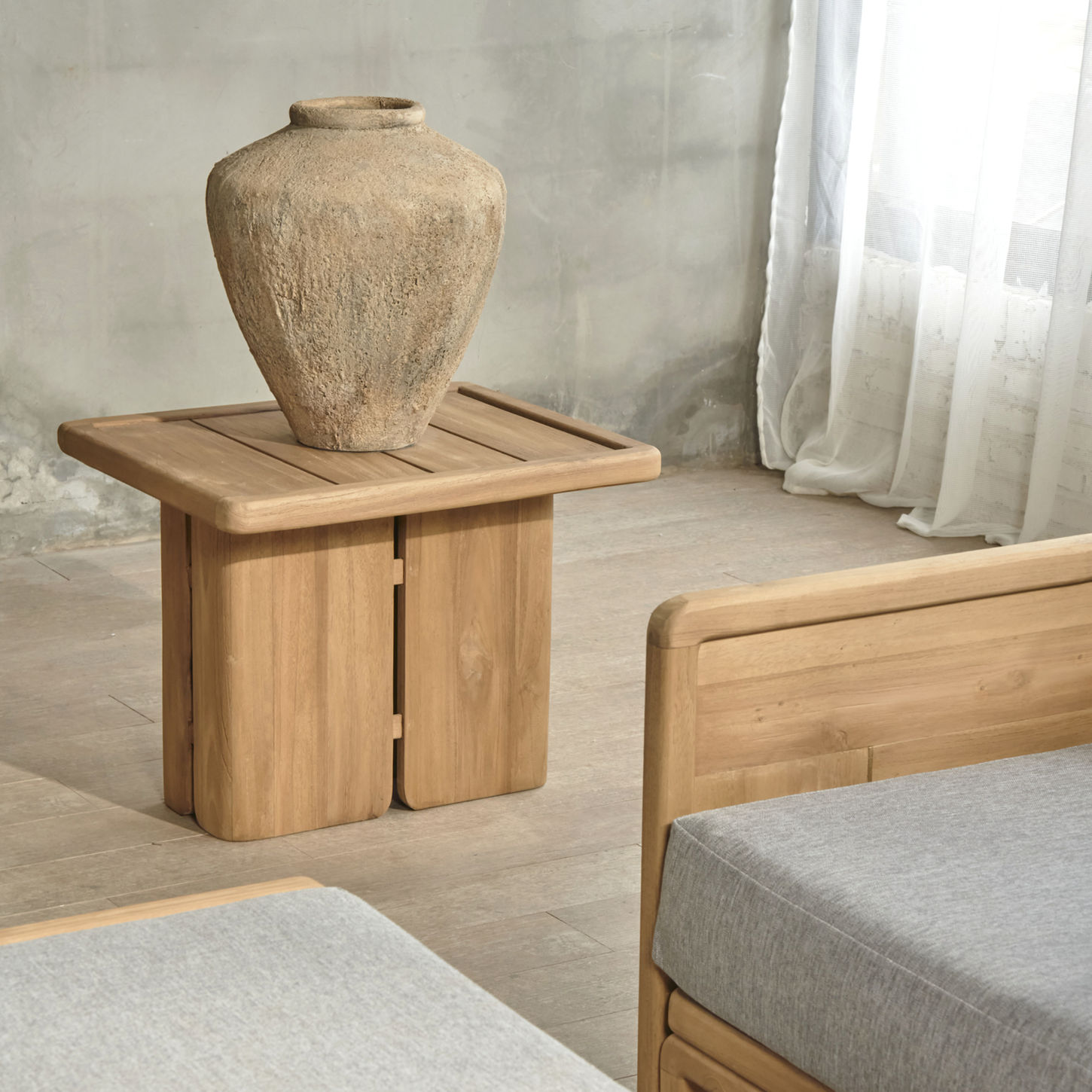 Modern outdoor end table with slatted top and leg