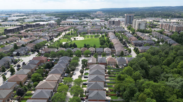 Drone view over a Burlington neighbourhood toward the Niagara Escarpment