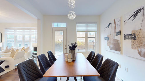 Dining room with bay windows in a Milton detached home