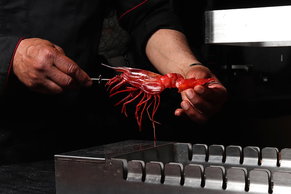 Cocina de brasas Oribu , donde los clientes pueden manejar sus propios alimentos.