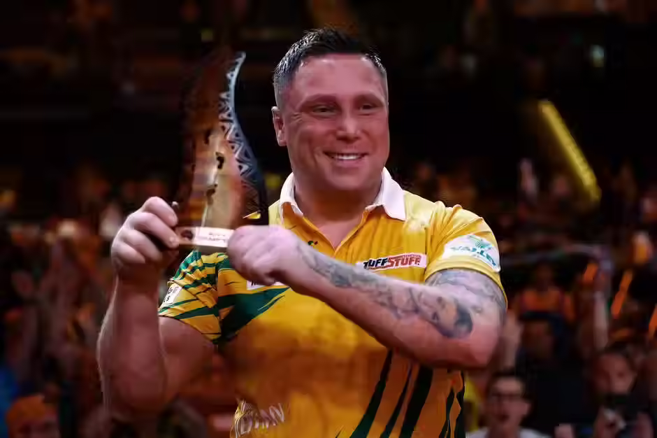 Gerwyn Price with the trophy after victory at the 2024 Australian Darts Masters (Photo by: Kevin Manning)