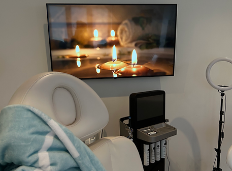 Private consultation room at Crane Medical Clinic in Little Sutton, Ellesmere Port, with treatment chair and skin consultation equipment.