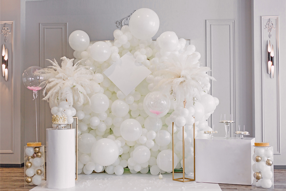 White balloon wall and plinths