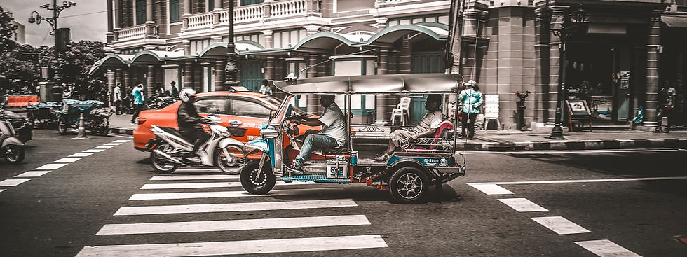 Tuk Tuks in street