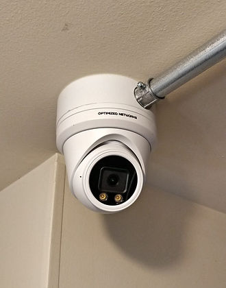 Dome security camera mounted on a ceiling