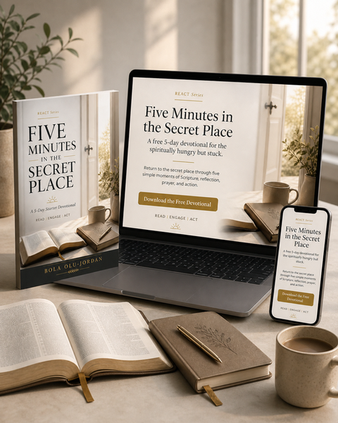 woman cluthing hands on the bible praying