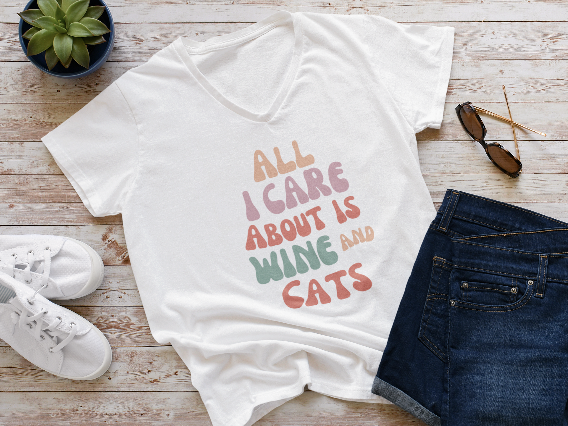 Women's V-Neck T-Shirt With Funny Quote "All I Care About Is Wine and Cats"