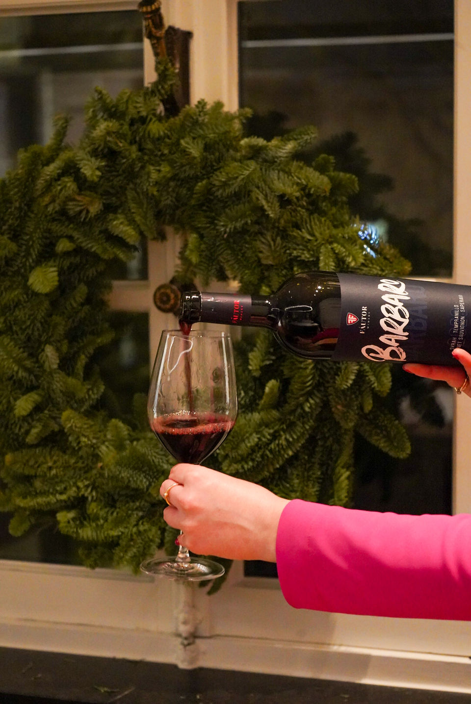 pouring Moldovan wine at event