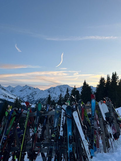 All the skis in front of Seppi's at sunset