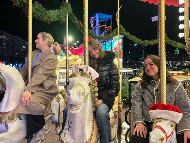 3 girls in a carroussel in monaco
