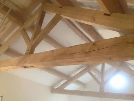 Beams all cleaned and like new again after removal of red stain varnish in Holmes Chapel Cheshire.